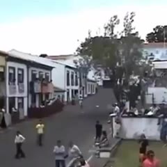 Watch out there is a bull behind you.