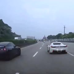 Idiot in Ferrari causes GTR to crash