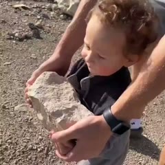 Kid throws a rock