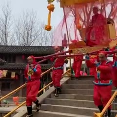 Emperor falls out when being carried down stairs