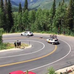 Bikers Crash into Support Vehicles during Race