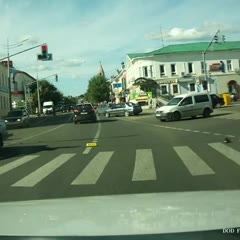 Biker Lands on Car Roof After Crash