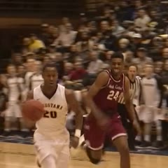 Basketball player blocks shot, slams into backboard