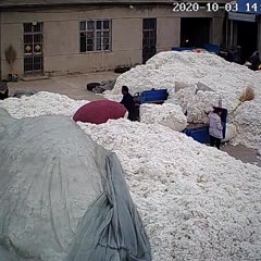 Opening bags with a lighter in cotton factory
