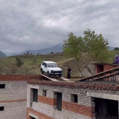 Stuntman in Lada Niva fails at multi-building leap