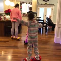 Girl does a long spin on hoverboard and faceplants