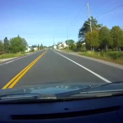 Sparks Fly as Truck Flips onto House