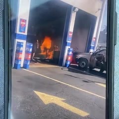Lube tech drilling into a gas tank