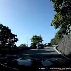 Cars dodging falling rocks during Taiwan earthquake