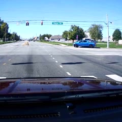 Red Light Runner Launched Into the Air After Accident
