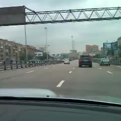A guy drives into a traffic jam
